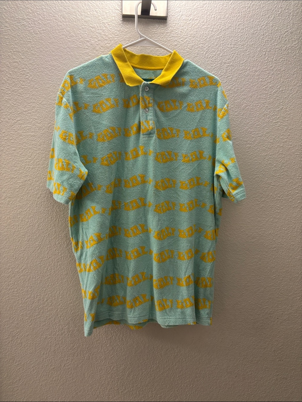 Mint Knit Polo with Yellow Collar and All-Over Graphic